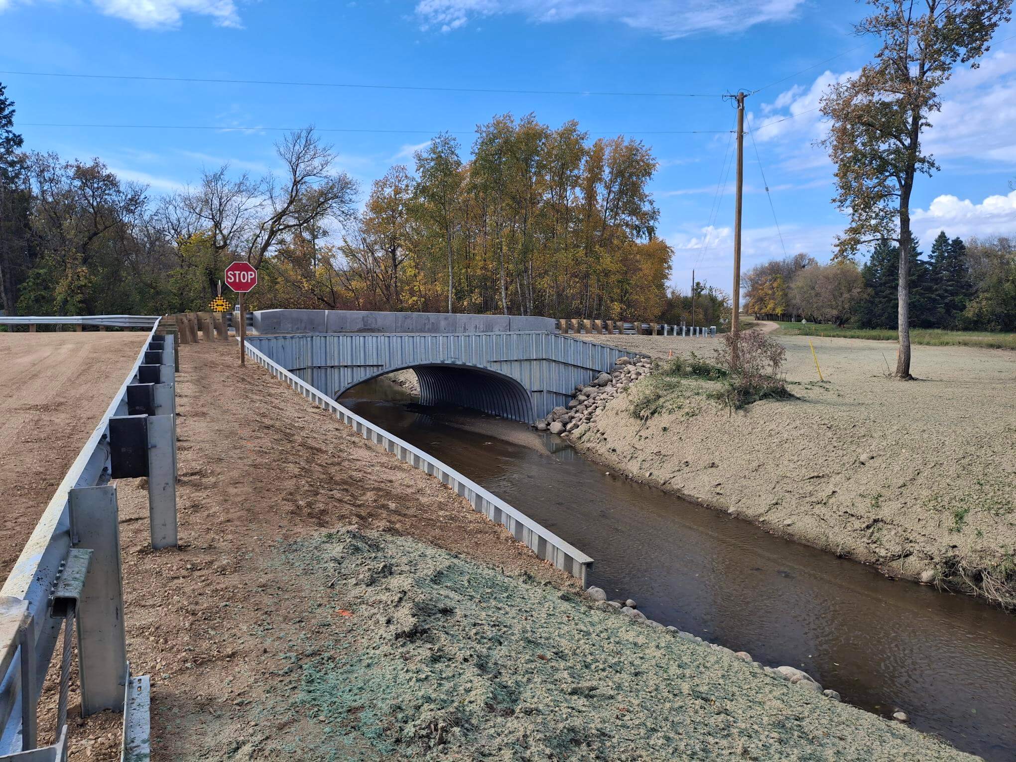 Armtec: Municipality of Ethelbert Replaces Critical River Crossing with Armtec BRIDGE-PLATE® Box Culvert. Project Image 1